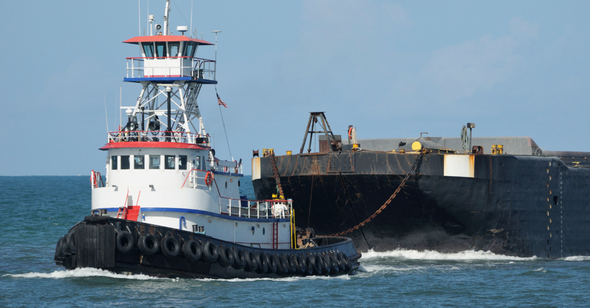 Maritime worker performing duties on barge at Brownsville port